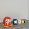 Daruma babushka i forskellige farver